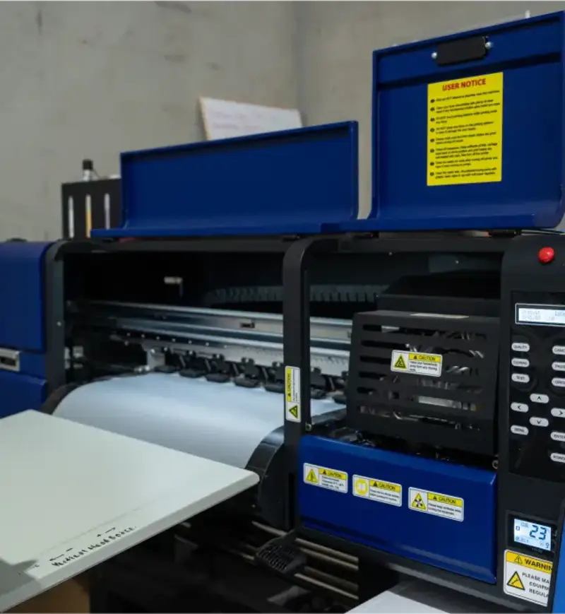 Front of the DTF printer with its blue lid raised