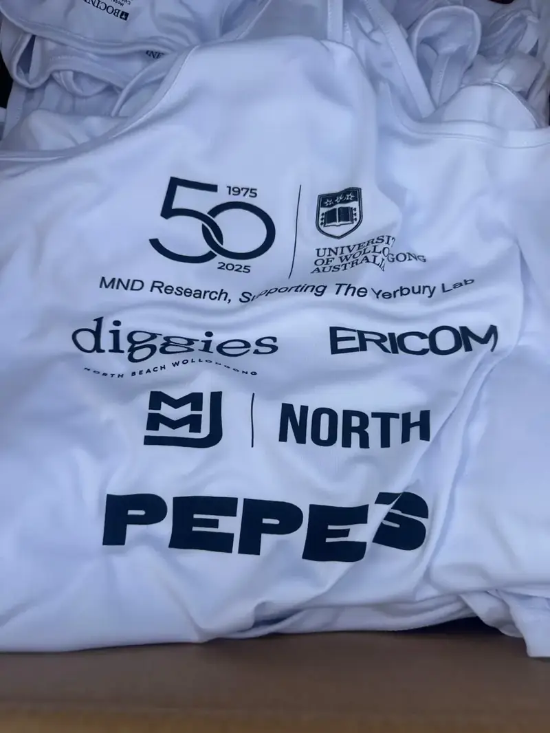 Light blue event shirt with sponsor logos