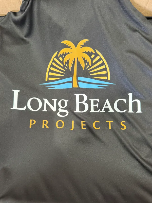 Black shirt printed with a Long Beach Projects palm tree logo