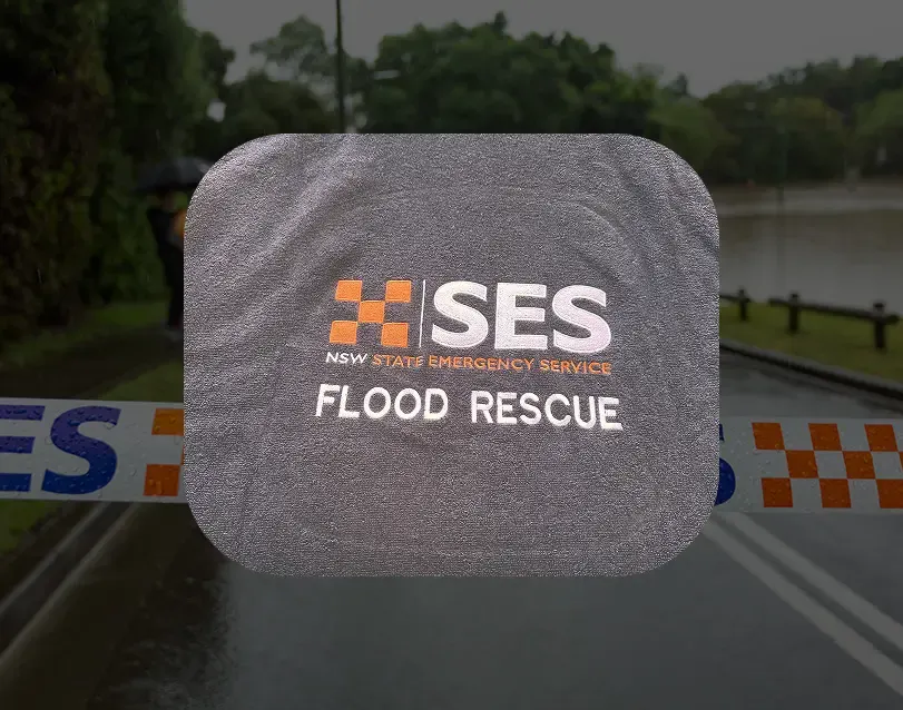 Grey towelling embroidered with the NSW SES and Flood Rescue logos