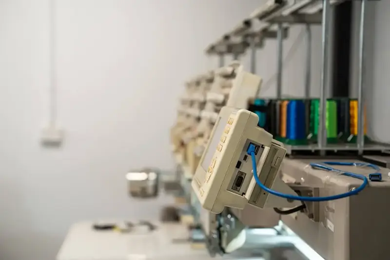 Embroidery machine heads