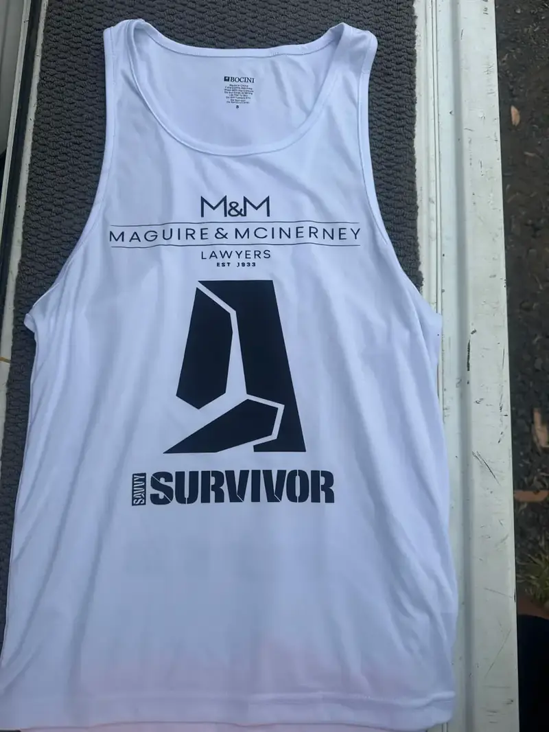 Light singlet printed with a law firm logo