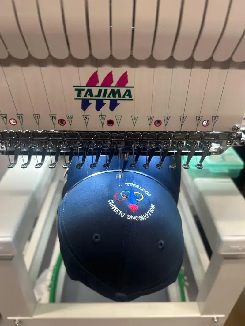 Embroidering a cap on a Tajima machine