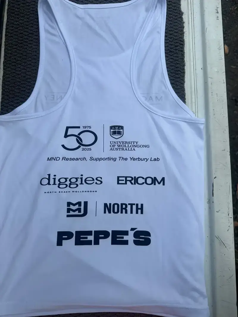 White singlet with sponsor logos printed across the back